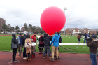 A weather balloon launch as part of a workshop led by Artists-in-residence Mick Lorusso and Joel Ong. Participants of this workshop deigned and built balloon payloads to capture airborne bacteria. 