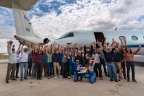 Zoom image: Members of the BioSCape Science, Aircraft, and Instrument teams in front of the JSC GV and the LaRC GIII in Cape Town, South Africa. Photo: O.Whitehead. 