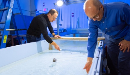 The team uses a video camera overhead and an object-detection model to track the shiners' movements, as well as the water velocity, inside the flume. 