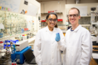 UB researchers Anjula Kosswattaarachchi (left), a PhD student in chemistry, and Timothy Cook, an assistant professor of chemistry, are exploring whether methylene blue — a fabric dye and industrial pollutant — can be repurposed in liquid-based batteries. 