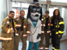 Firefighters with mascot