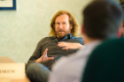 During his visit to UB, Tom Toles met twice with small groups of faculty, staff and students. Photo: Dylan Buyskes