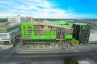 UB's new medical school building is taking shape on the Buffalo Niagara Medical Campus. This exterior view is from Main Street. Note the slant to the roof. Photo: Douglas Levere