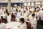 The new residents recite the Hippocratic Oath. Photo: Douglas Levere