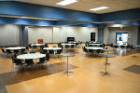 Banquet-style seating is available for up to 200, with space for refreshments and presentation. Picture shows 145 AFBE, which is 2/3 of the room, seating for 100 with room for activities and bistro tables.