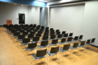 Lecture-style seating is available in all wall configuration options, capacity varies. Picture shows 145 A+F, which is 1/3 of the room, seating for 70 with a podium. 