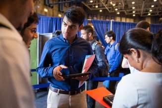 Students and company representatives at the STEAM Job and Internship Fair organized by the Career Design Center in Alumni Arena.
