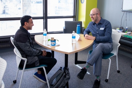 A UB grad meeting with a UB student for a mentoring conversation.