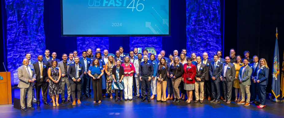 Group photo of our 2024 Fast 46 finalists on stage at the Fast 46 celebration. 