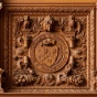 The UB seal is centered in an elaborately carved wooden mantel over the fireplace in the Health Sciences Library, Abbott Hall, South Campus. 