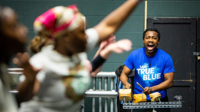 Music instructor in dance class.