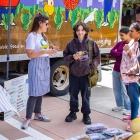 Students learning about fresh vegetables at the Veggie Van on UB's North Campus. 