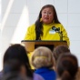 A speaker addressing a crowd of attendees at the celebration of UB's new Indigenous Studies department. 