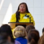 A speaker addressing a crowd of attendees at the celebration of UB's new Indigenous Studies department. 