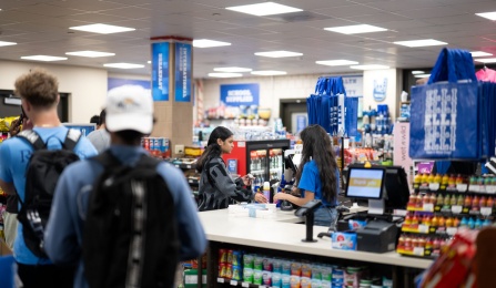 Students purchasing snacks at the Elli convenience store.