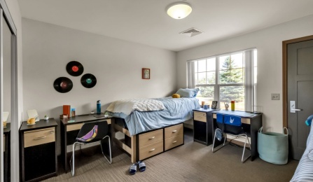 Staged bedroom in a Creekside Village apartment.