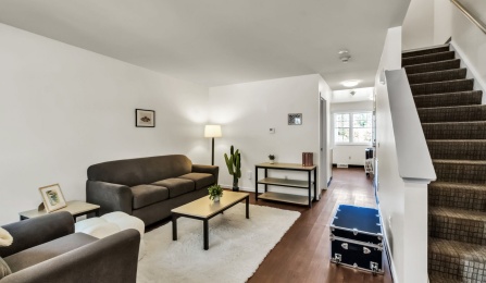 Staged living room in Flickinger Court apartment.