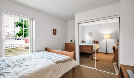 Staged bedroom in a Hadley Village apartment.