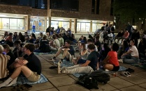 Residents sitting on the terrace at RHA event - trivia night. 