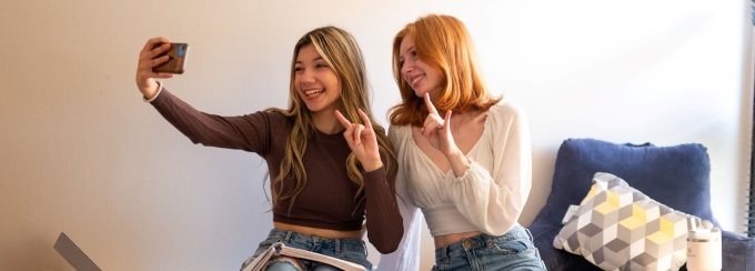 Students hanging out in their dorm room.