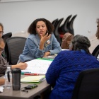 Faculty members having a discussion. 