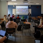 Students in an American Studies class, taught by Jennifer Loft, in Cooke Hall in March 2022. 