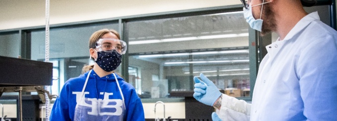 Students participate in 100 level chemistry labs in the Natural Sciences Complex in October 2020. Students demonstrate proper use of face coverings and other PPE while working in a research lab, in keeping with current guidelines. 