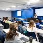 Students sitting in a classroom. 