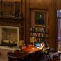 A student studying in a library space. 