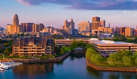 Aerial image of downtown Buffalo, NY, including the Erie Basin Marina and Riverworks taken an evening in June 2021. Photographer: Douglas Levere This image has been approved by University Communications—under the guidance of UB’s Office of Environment, Health and Safety—to align with current health and safety regulations during the COVID-19 pandemic.