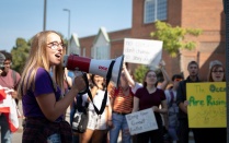 Members of the UB community participating in the Climate Strike on September 20, 2019 near the Student Union on the North Campus. The UB strike was in solidarity with millions of people in 150 countries who walked out of school and work to demand that world leaders take action to address climate change. Photographer: Meredith Forrest Kulwicki. 