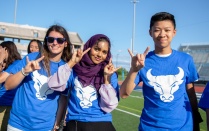 Students gather at the UB Stadium for the New Student Welcome event where they work together to form an Interlocking UB (Human UB) for an aerial photo. Photographer: Meredith Forrest Kulwicki.