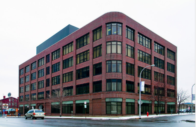 Communities of Care Project is housed on UB's Downtown Campus, as part of Buffalo Niagara Medical Campus, 1021 Main St., Buffalo NY, 14203-1016. The five-story, red brick building is pictured. 