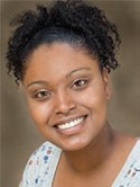 Portrait of Christine King smiling.