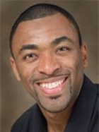 Portrait of Morris Green smiling.