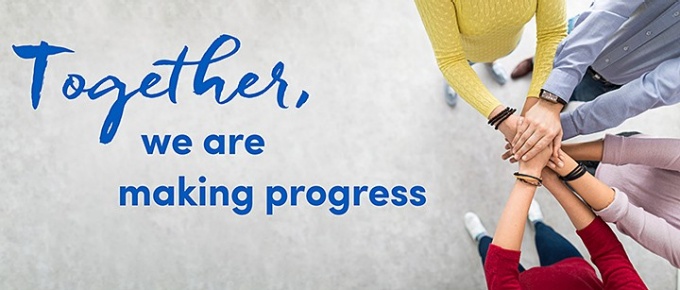 hands clasped with caption "Together, we are making progress".