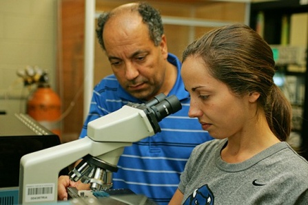 RIA Scientist Samir Haj-Dahmane, PhD (left) and student Katherine Evely.