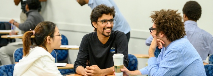 Students having conversation.