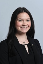 Headshot of Cora Covey.