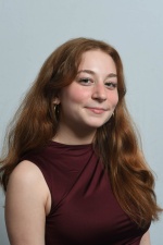 Headshot of Zoe Kahn.