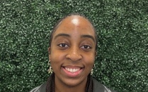 alt="Tombari Augustine headshot".