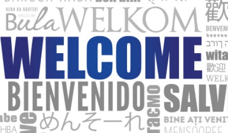 A word cloud of the word "welcome" in multiple languages. 