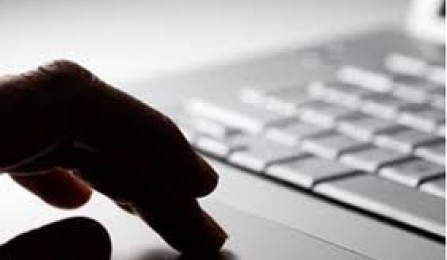 fingers over a keyboard.