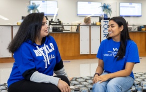 Student chatting in 1Capen.