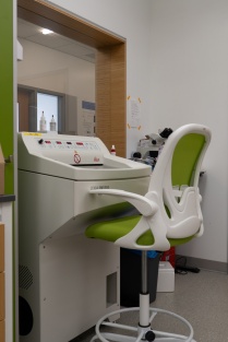 a research machine with a chair to sit at. 