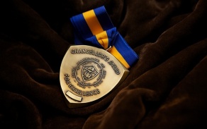 Medal on ribbon.