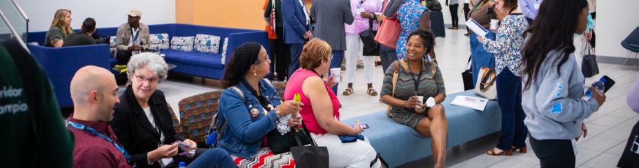 Photo shows community gathering at event.