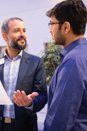 An alumni providing feedback on a student's resume.