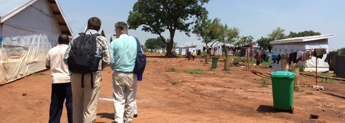 Drs. Jim Jensen and Chris Lowry meeting with representatives from the Danish Refugee Council in Uganda.