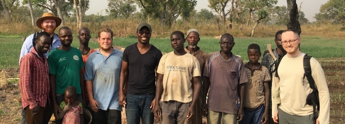 Geophysics research team with farmers from Kparigu, Northern Region after electromagnetic surveying and soil monitoring.